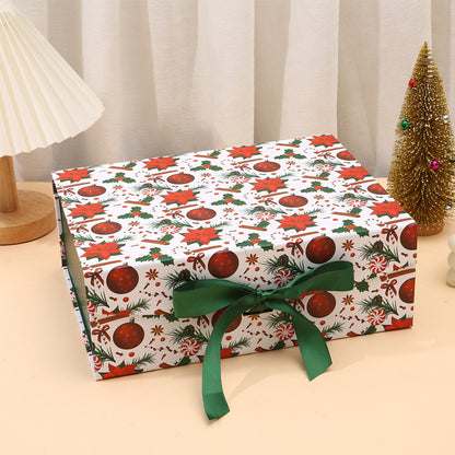 Gift box wrapped in festive paper with a green ribbon on a neutral background